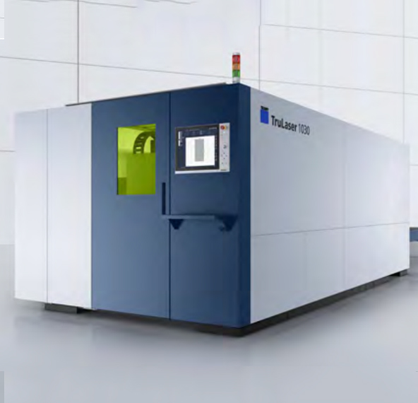 High-precision laser cutting machine in action at Samarth Sharp Edge.
